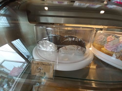 Labelled vegan cakd at Little Cottage by Ticha Cakes in Pai