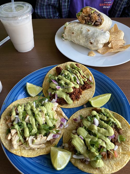 Horchata, taco trio, and burrito  at Veganixima in Orange
