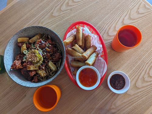 Lychee pork handmade noodles with spring rolls at Belly Worship in Auckland