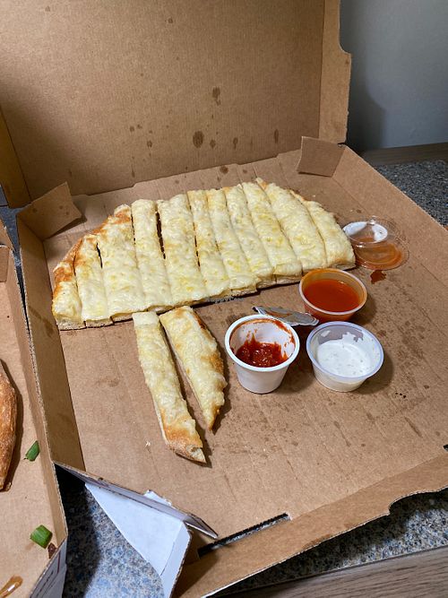  Veganstix with 3 dipping options - vegan ranch, marinara and Buffalo at Toppers Pizza - West Ave in La Crosse