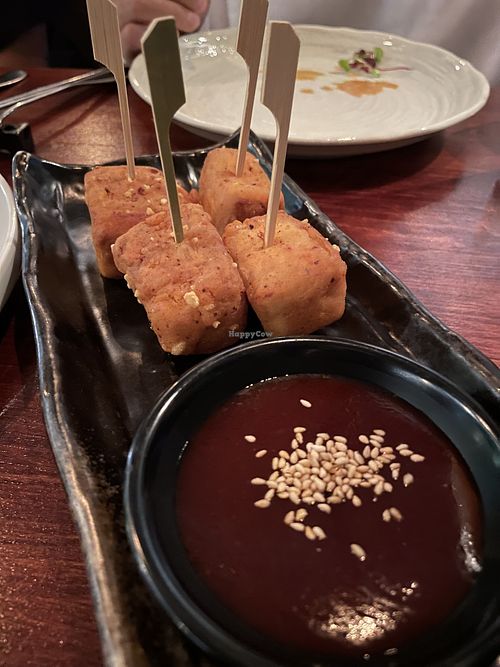 Tofu skewers with dipping sauce  at Jinjuu Soho in London
