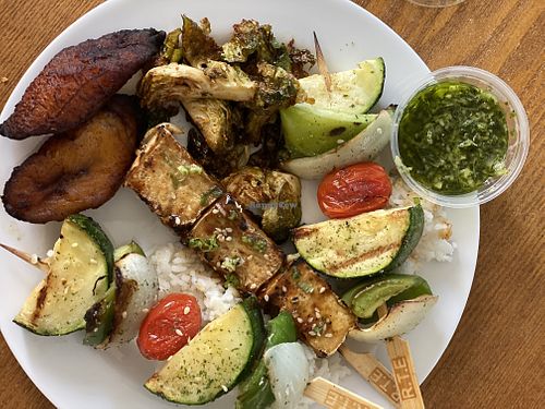 Tofu and veggie skewers with white rice, plantains and Brussels. Ordered Togo and plaited at home.  at RTE in Stanton