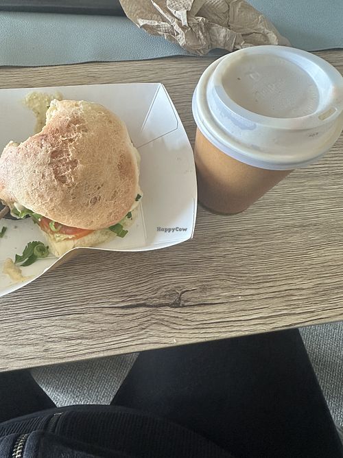 Very small coffee next to the tiny vegan burgerr  at Frocals Kings Beach in Caloundra