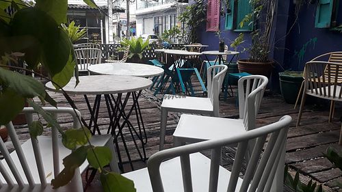 Outside seating at The Road Less Travelled in Koh Samui