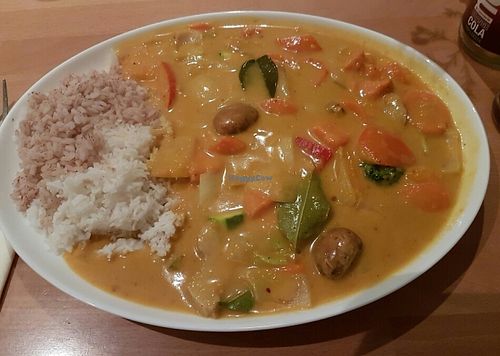 Main course - yellow curry with pumpkin and sweet potato  at Well Being in Cologne