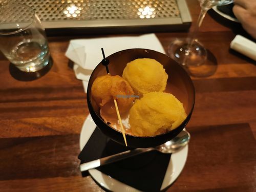 Delicious homemaid vegan ginger sherbet with tempura lychee. Makes your tongue tingle.  at Seray in Hillegom