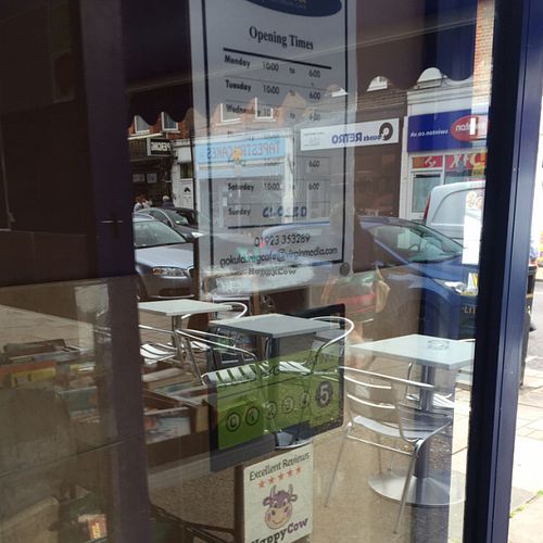 proudly displaying a Happycow sticker! at GoKula Vegetarian Cafe in Watford