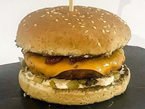 Beyond Classic Burger with vegan cheddar, homemade burger sauce, chopped onions, pickles and sun-dried tomatoes. at Goblins Kitchen in Bratislava