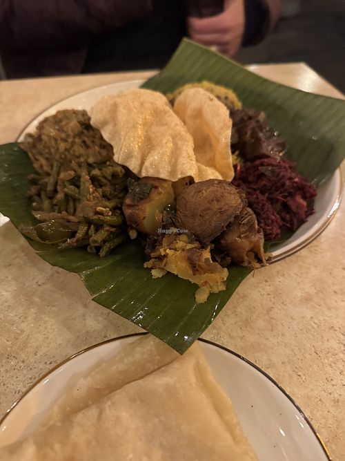 Rice and curry plate with banana leaf curry  at Mirisata in Portland