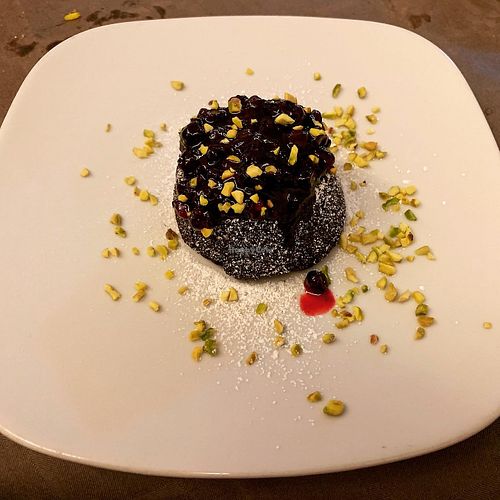 Vegan chocolate lava cake with fruit sauce at Historic Route 66 Pub in Caltanissetta