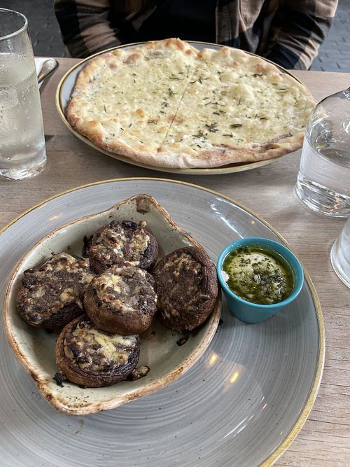 Filled mushrooms and garlic bread with rosemary at Wildwood in Plymouth