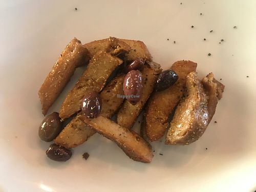 Seitan porchetta with taggiaschw olives and fennel (vegan) at Namo Ristobottega in Tarquinia