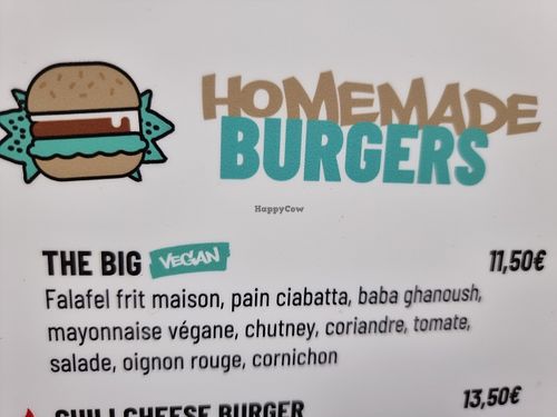 vegan options clearly labeled on menu at Simbiosa in Luxembourg City