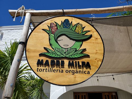 Signage at Madre Milpa in Playa Del Carmen