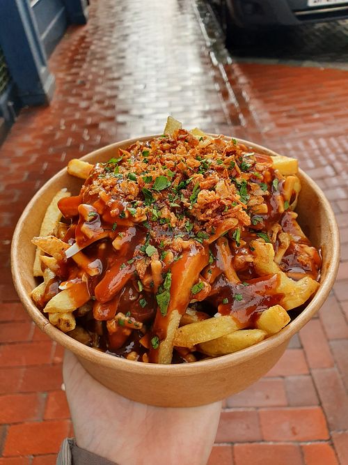 Large vegan poutine bought at store for takeaway - £7.50 at Poutine City in Brighton