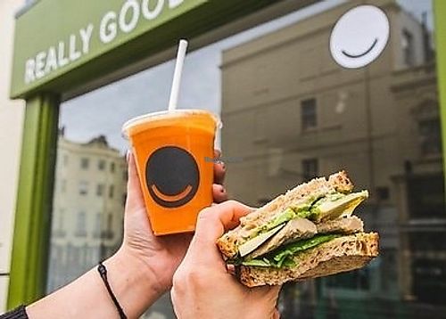 Sandwich and juice outside Really Good Juice - picture from an article at Really Good Juice in Hove