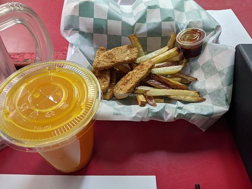 Pineapple tonic, crispy vegan strips with fresh cut fries at RA Vegan Cafe in Houston