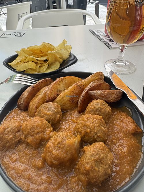 Albondigas menu del dia (comes with a drink and chips)  at Santa y Pura in Madrid