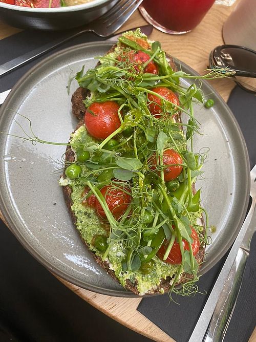 Vegan toast with almond ricotta and pesto at Angel Cakes in Krasnodar