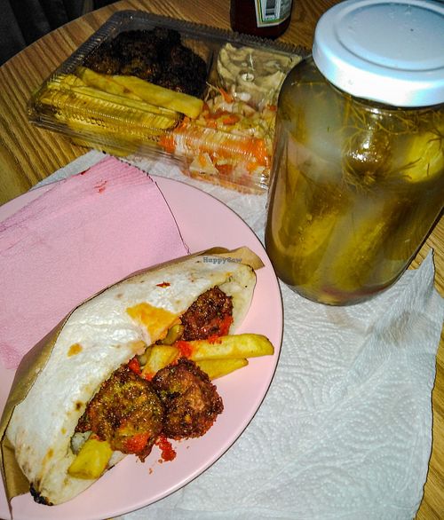 Half Falafel Sandwich, jar of dill & garlic pickles and a Falafel set at Falafel Ruty - Mediterranean Food in Pattaya