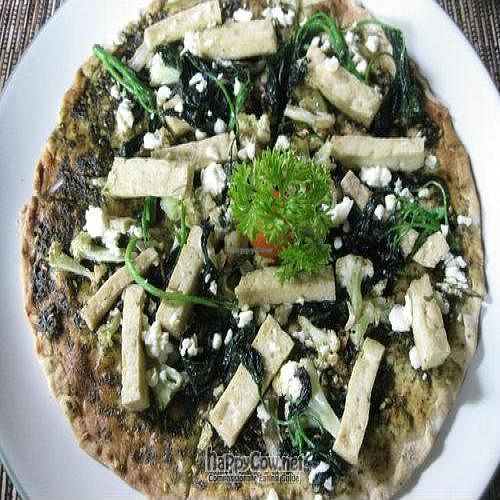 Vegan pizza with broccoli, tofu topping at Sari Organic Cafe at Little Tree in Kuta