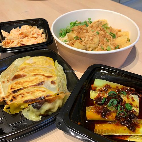 Spicy cucumber, vegan dumplings, dandan nopdles & bean curd.  at Noodle Master in Helsinki