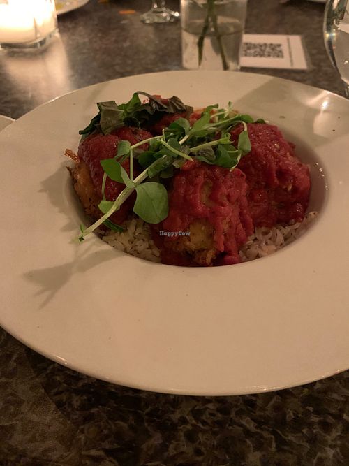 Vegan meatball bowl on brown basmati rice with tomato sauce  at Luna Kitchen Bar in Regina