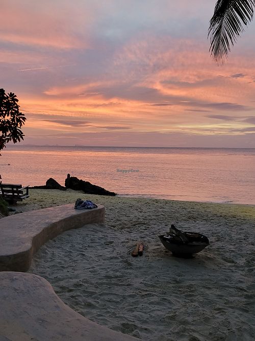 Outdoor seating with view and fire pit at SeaTara in Koh Phangan