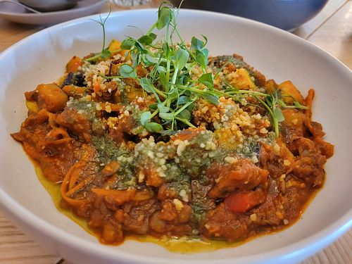 Caponata of season vegetables with lentils and soya meat in tomato sauce at Vitary in Odessa