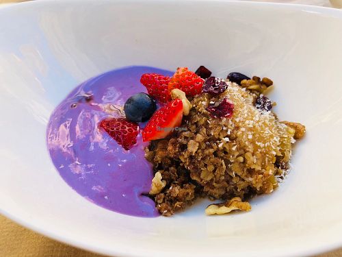 Apple crumble with berries soy yogurt at Aguaribay in Barcelona