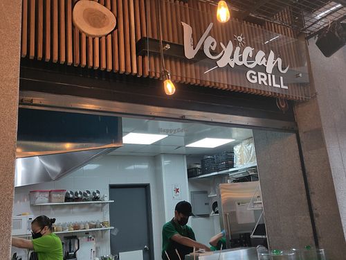 Vexican grill take out window at Verde Y Rojo in Tijuana