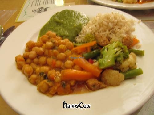 Mains - chickpea stew, mixed veggies, brown rice (exciting!) & pureed spinach - not the most photogenically appetizing, but it tasted wonderful! at Como En Casa in Arequipa
