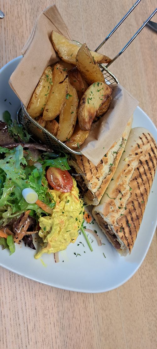 Seitan steak and caramelised onion panini & fries at Vegan Earth in Ayr