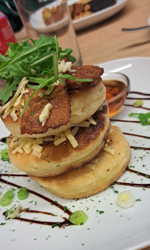 Pancake stack: vegan cheese, bakon, maple syrup at Vegan Earth in Ayr