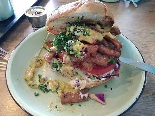 Lekker Cheezy burger with "chicken" strips, cheese and salad at Lekker Vegan in Midrand