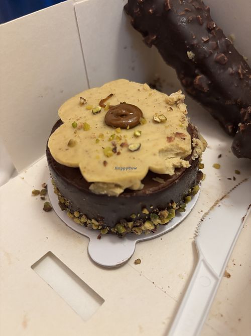 It broke a little bit while taking it home   at Eter Vegan Bakery in Warsaw