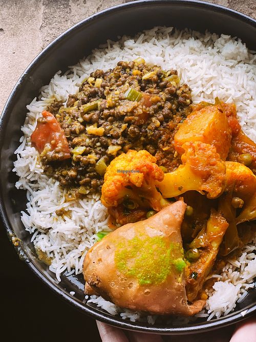 Black daal & Aalo Gobi. Vegetable samosa with mint chutney .  at Everest Tikka House in Moorhead