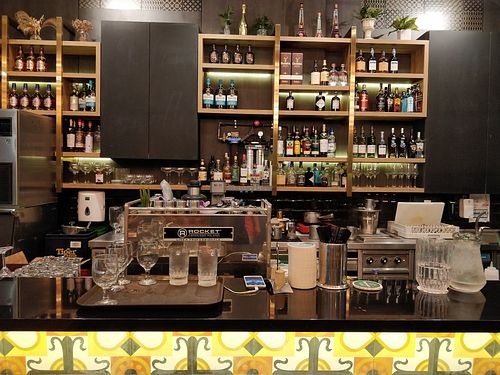 Bar counter and wide collection of gins & rums from India at Masalaa Bar in East Singapore