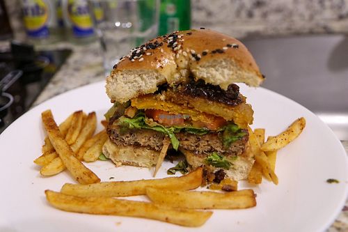 burger with fries at Eleven Oh 7 in Saint Michael