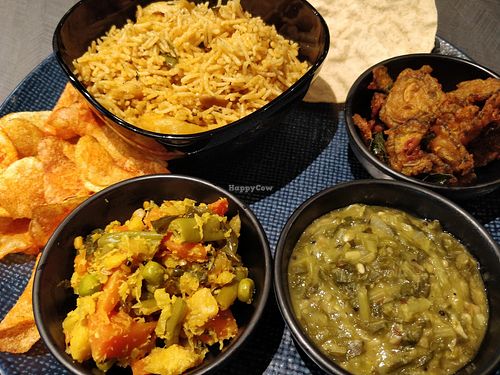 Briyani Plate
(Briyani Rice, choice of Fish Gravy/ Chicken Gravy/ Crab Masala, 3 Vegetables of the Day, Appalam, Home-made Potato Chips, and Carrot Halwa) at Fennel by Komala Vilas in Central Singapore
