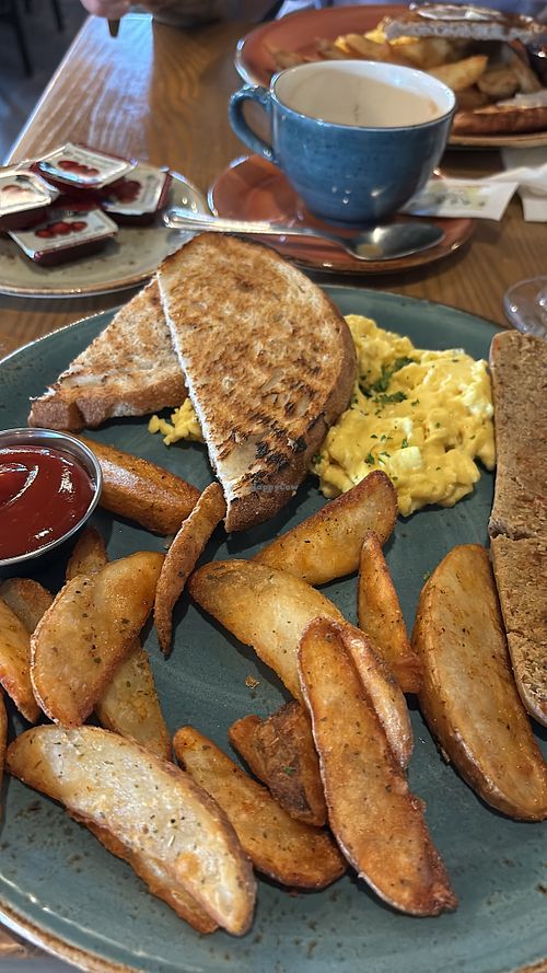 Toast / scramble vegan just egg , apple vegan sausage and home fries   at Milestones in Ancaster