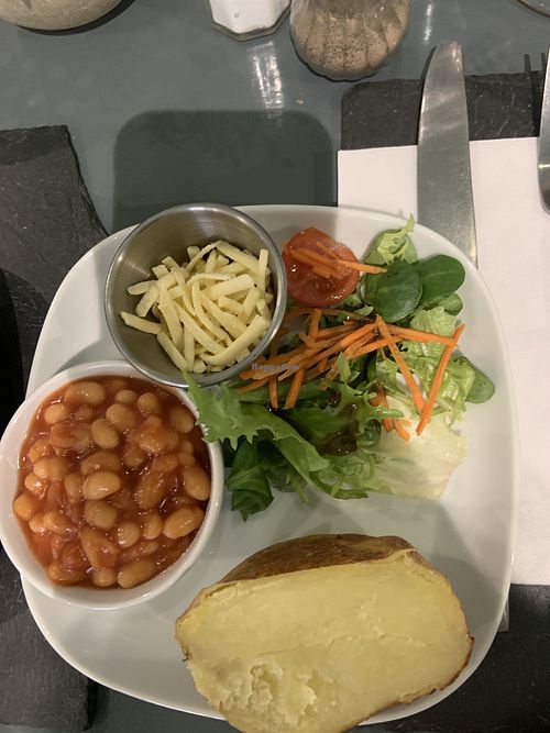 (Half of) jacket potato with beans and cheese  at Green Island Bistro in Rhuddlan