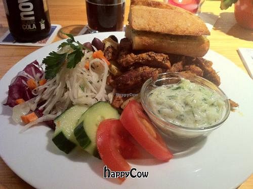 Gyros Plate with soy-gyros, pita bread with herb-butter, coleslaw, tzatziki, hummus and olives. at Viasko - Bar und Restaurant in Berlin