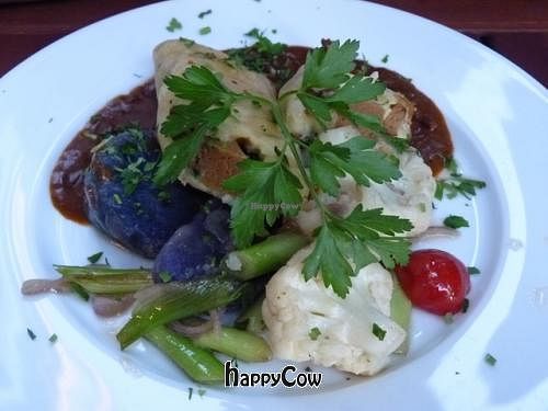Homemade seitan filet with cauliflower in a brickdough. at Viasko - Bar und Restaurant in Berlin
