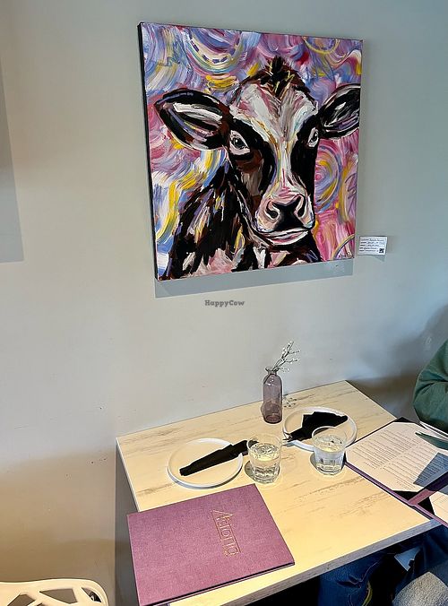 Table with Happy Cow at Astoria Bistro Botanique in Gatineau