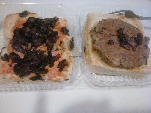 Ultimate vegan burger kolache. Tomato cream cheese kolache with sauteed mushrooms, tops Housemade 3 bean smoked veggie patty with pickles, caramelized onions.  at Sinfull Bakery in Houston