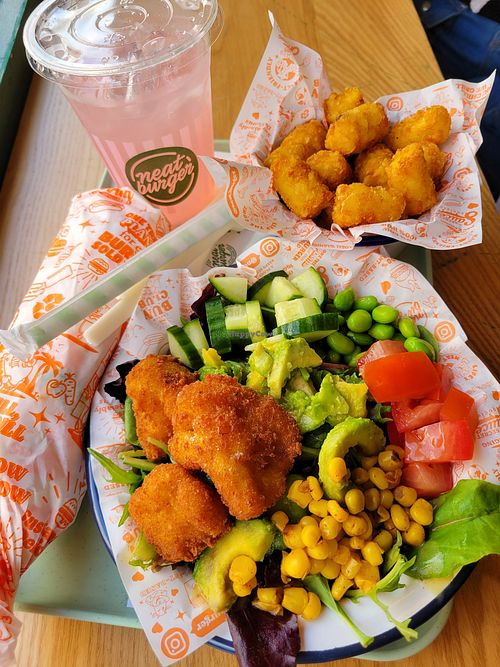 Salad option with cauliflower wings, tater tots, a mushroom meat wrap (great) and pink lemonade (too sweet) at Neat - Soho in London