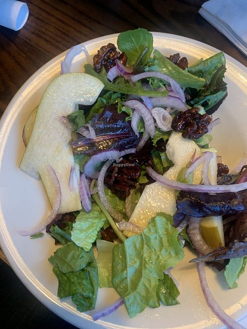 Vegan pear and walnut salad - started eating before I took the pic…looked better when I got it lol   at Wally's Pizza Bar in Cameron Park