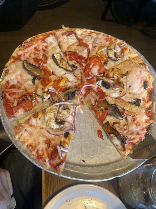 Vegan pizza with mushrooms, peppers, and onions   at Wally's Pizza Bar in Cameron Park