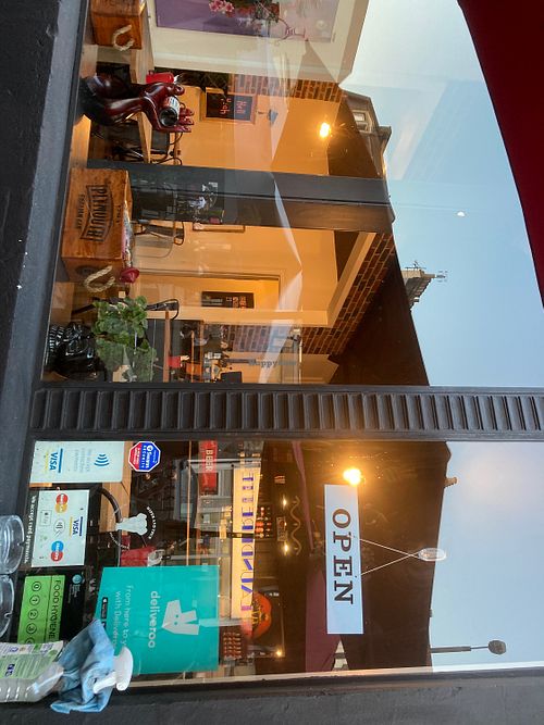 Looking in from the front patio at Seitan's Corner in Bristol